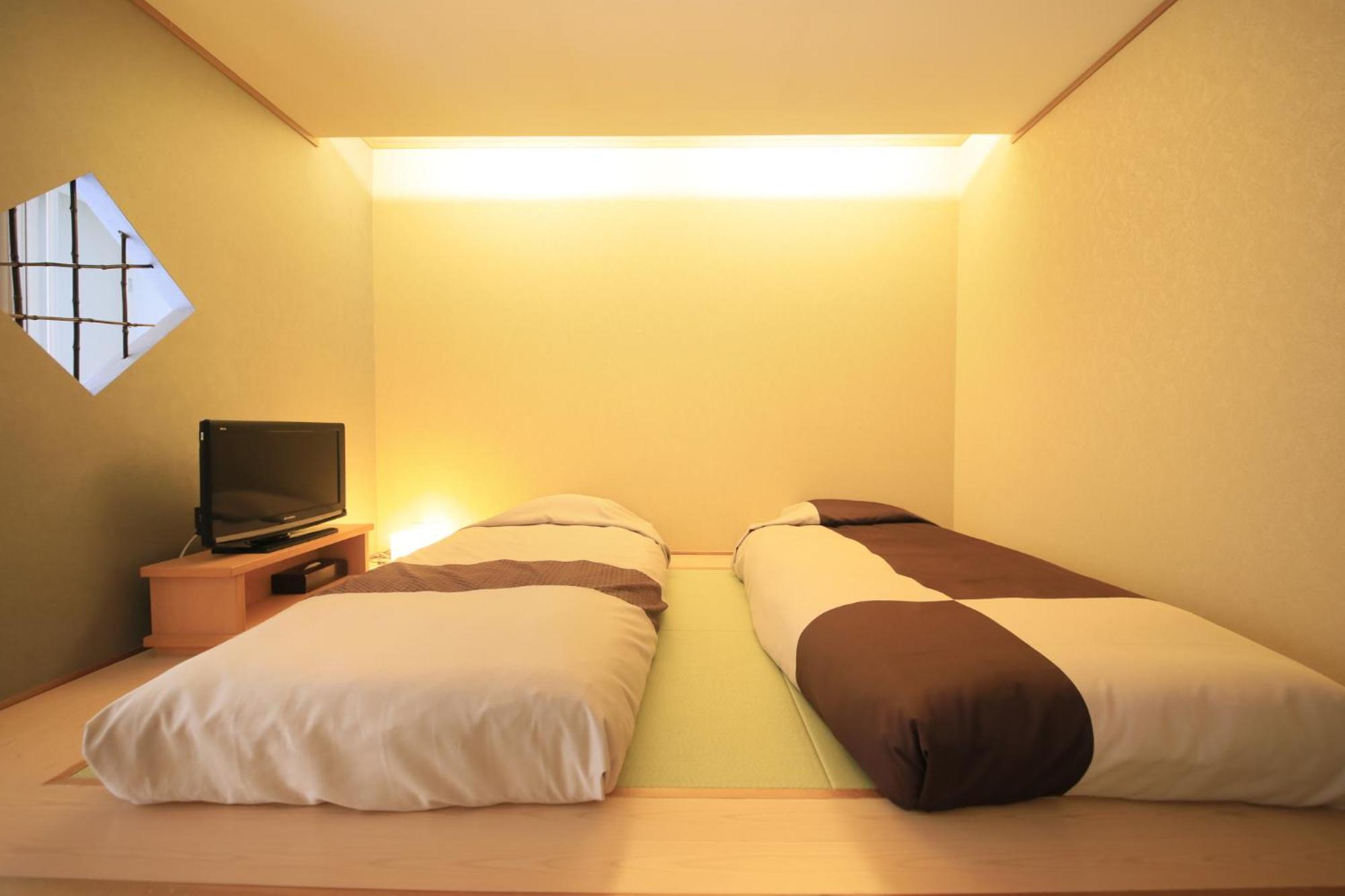 Fulsato Hotell Tsuchihatakozan Rum bild